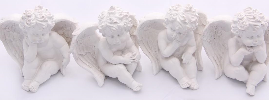 Статуэтки ангелочков в интерьере (56 фото)